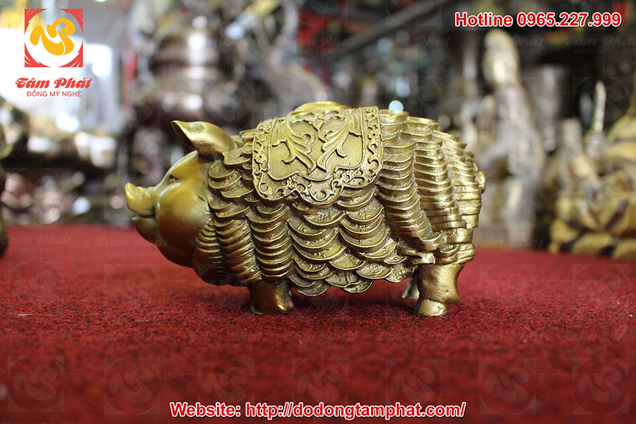 Tượng heo phong thủy cõng tiền vàng