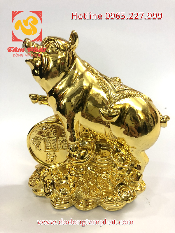 Tượng lợn mạ vàng cao cấp nằm trên tiền xu cổ