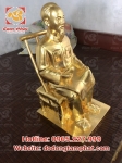 Tượng đồng Bác Hồ ngồi đọc báo Nhân Dân Xã Luận thiếp vàng cao 60cm