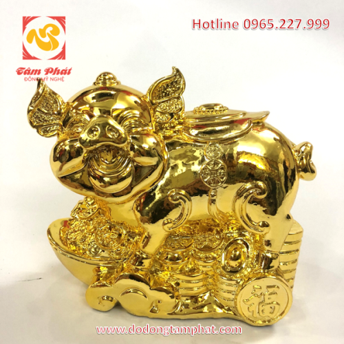 Tượng lợn mạ vàng cao cấp nằm trên tiền xu cổ